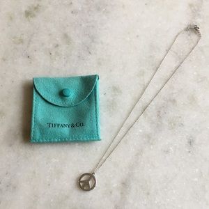 Tiffany & Co - Peace sign necklace